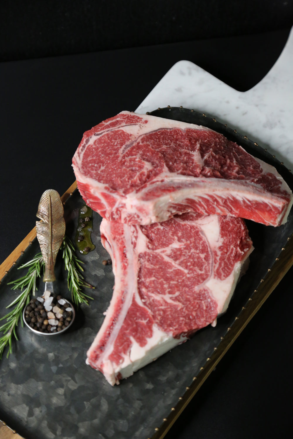 S Ranch bone-in steak on a cutting board